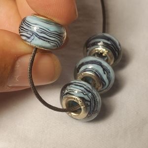 4 .925 silver and glass beads